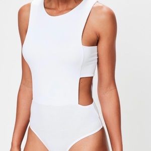 NWT MISSGUIDED Brand bodysuit in White. Size 4.